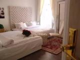 Deluxe Quadruple room with city view