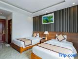 Standard Triple room with garden view