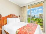 Standard Quadruple room with balcony and with partial ocean view