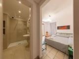 Superior Triple room with balcony and with garden view