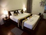 Standard Quadruple room with balcony and with partial view