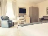 Junior Suite with balcony and with partial view