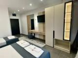 Standard Triple room with partial sea view