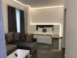 Standard Quadruple room with partial sea view
