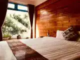 Standard Triple room with garden view