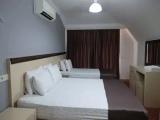 Classic Triple Suite with balcony and with garden view