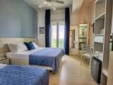 Superior Triple room with balcony and with sea view