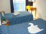 Standard Triple room with courtyard view