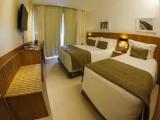 Standard Triple room with balcony and with partial sea view