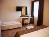 Standard Triple room with balcony and with courtyard view