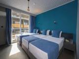 Triple room with balcony and Side Sea View