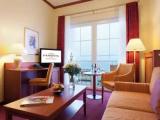 Standard Triple room with partial sea view