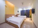Quadruple Family Suite with balcony and with city view