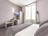 Superior Quadruple room with balcony and with city view