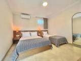 Standard Triple room with garden view