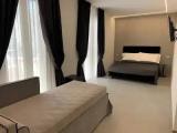 Standard Triple room with balcony and with partial sea view