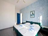Standard Triple room with balcony and with garden view