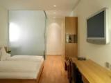 Standard Triple room with garden view