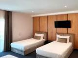 Standard Quadruple room with garden view