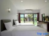 Standard Triple room with garden view