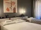 Standard Triple room with courtyard view