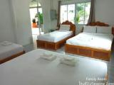 Standard Quadruple Family room with garden view