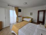 Standard Quadruple room with balcony and with sea view