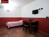 Standard Triple room with garden view