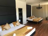 Deluxe Quadruple room with balcony and with sea view
