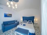 Standard Quadruple room with balcony and with sea view