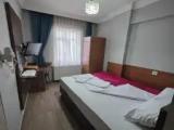 Standard Quadruple room with city view
