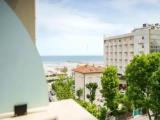 Standard Quadruple room with partial sea view