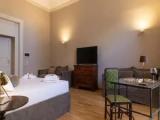 Deluxe Quadruple room with balcony