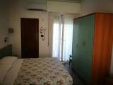 Standard Triple room with balcony and with garden view