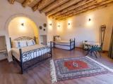 Standard Quadruple room with garden view
