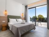 Standard Triple room with partial sea view
