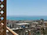 Standard Triple Family room with balcony and with partial sea view