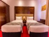 Deluxe Quadruple room with balcony