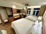 Executive Quadruple room with city view