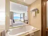 Grand Triple room with partial ocean view