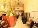 Standard Quadruple Family room with courtyard view