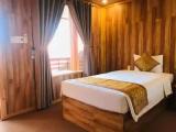 Standard Triple room with garden view