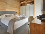Deluxe Quadruple room with balcony