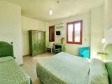 Standard Triple room with garden view