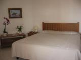 Standard Triple room with garden view