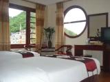 Deluxe Triple room with balcony and with mountain view