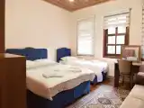 Standard Triple room with garden view