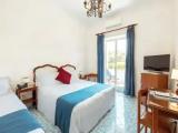 Superior Triple room with balcony and with garden view