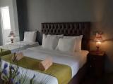 Deluxe Triple room with balcony and with mountain view
