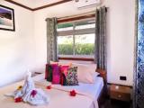 Standard Triple room with garden view